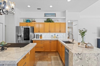 Situated on almost A HALF ACRE and sporting a freshly painted on River Wilderness Golf and Country Club in Florida - for sale on GolfHomes.com, golf home, golf lot