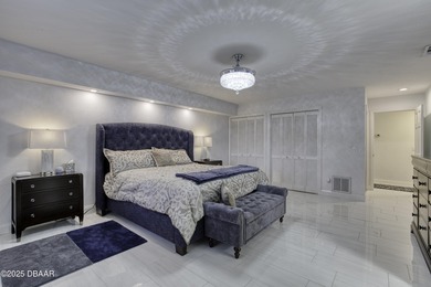 This extraordinary, designer-renovated 4-bedroom, 3-bath on Sugar Mill Country Club in Florida - for sale on GolfHomes.com, golf home, golf lot