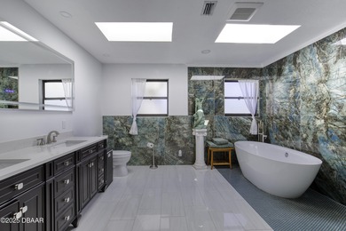 This extraordinary, designer-renovated 4-bedroom, 3-bath on Sugar Mill Country Club in Florida - for sale on GolfHomes.com, golf home, golf lot