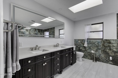 This extraordinary, designer-renovated 4-bedroom, 3-bath on Sugar Mill Country Club in Florida - for sale on GolfHomes.com, golf home, golf lot