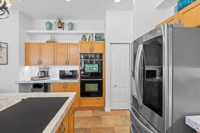 Situated on almost A HALF ACRE and sporting a freshly painted on River Wilderness Golf and Country Club in Florida - for sale on GolfHomes.com, golf home, golf lot