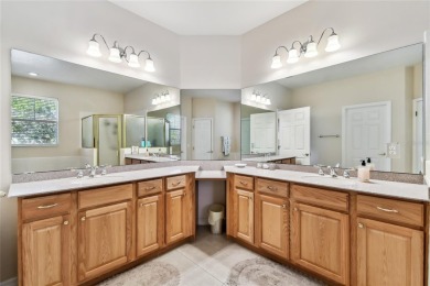 Beautiful and immaculately maintained Savoy model featuring a on Poinciana Golf Club in Florida - for sale on GolfHomes.com, golf home, golf lot