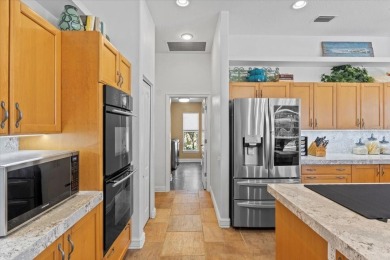 Situated on almost A HALF ACRE and sporting a freshly painted on River Wilderness Golf and Country Club in Florida - for sale on GolfHomes.com, golf home, golf lot