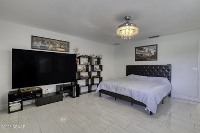 This extraordinary, designer-renovated 4-bedroom, 3-bath on Sugar Mill Country Club in Florida - for sale on GolfHomes.com, golf home, golf lot