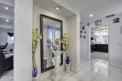 This extraordinary, designer-renovated 4-bedroom, 3-bath on Sugar Mill Country Club in Florida - for sale on GolfHomes.com, golf home, golf lot