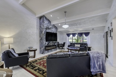 This extraordinary, designer-renovated 4-bedroom, 3-bath on Sugar Mill Country Club in Florida - for sale on GolfHomes.com, golf home, golf lot