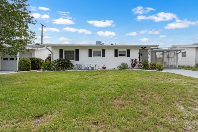 Adorable MOVE-IN READY 2-bedroom, 2-bathroom home with a POND on North Lakes Golf Course in Florida - for sale on GolfHomes.com, golf home, golf lot