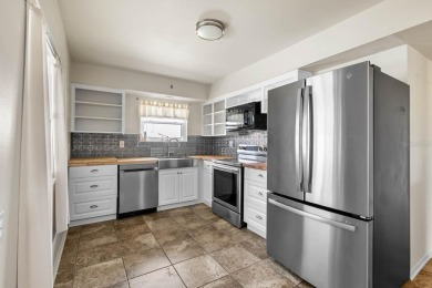Adorable MOVE-IN READY 2-bedroom, 2-bathroom home with a POND on North Lakes Golf Course in Florida - for sale on GolfHomes.com, golf home, golf lot