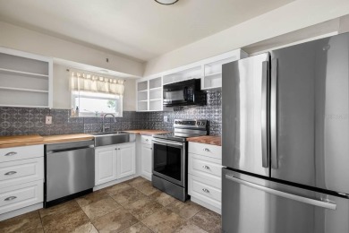 Adorable MOVE-IN READY 2-bedroom, 2-bathroom home with a POND on North Lakes Golf Course in Florida - for sale on GolfHomes.com, golf home, golf lot