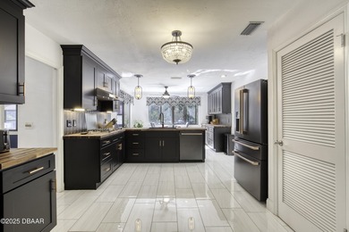 This extraordinary, designer-renovated 4-bedroom, 3-bath on Sugar Mill Country Club in Florida - for sale on GolfHomes.com, golf home, golf lot