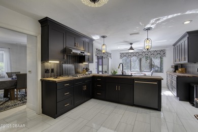 This extraordinary, designer-renovated 4-bedroom, 3-bath on Sugar Mill Country Club in Florida - for sale on GolfHomes.com, golf home, golf lot
