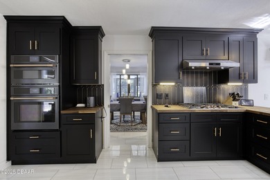 This extraordinary, designer-renovated 4-bedroom, 3-bath on Sugar Mill Country Club in Florida - for sale on GolfHomes.com, golf home, golf lot