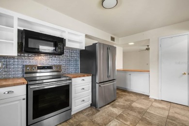 Adorable MOVE-IN READY 2-bedroom, 2-bathroom home with a POND on North Lakes Golf Course in Florida - for sale on GolfHomes.com, golf home, golf lot