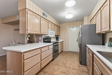 Rare larger Sun City West garden apartment offering spacious on Pebblebrook Golf Course in Arizona - for sale on GolfHomes.com, golf home, golf lot
