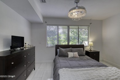 This extraordinary, designer-renovated 4-bedroom, 3-bath on Sugar Mill Country Club in Florida - for sale on GolfHomes.com, golf home, golf lot