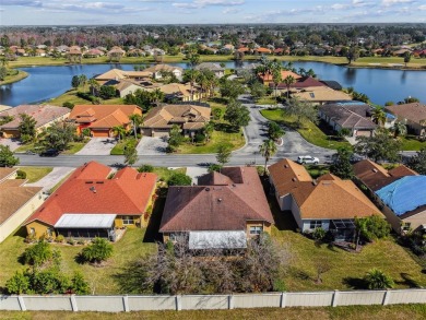 Beautiful and immaculately maintained Savoy model featuring a on Poinciana Golf Club in Florida - for sale on GolfHomes.com, golf home, golf lot