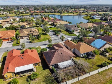 Beautiful and immaculately maintained Savoy model featuring a on Poinciana Golf Club in Florida - for sale on GolfHomes.com, golf home, golf lot