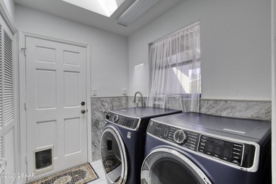 This extraordinary, designer-renovated 4-bedroom, 3-bath on Sugar Mill Country Club in Florida - for sale on GolfHomes.com, golf home, golf lot