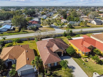 Beautiful and immaculately maintained Savoy model featuring a on Poinciana Golf Club in Florida - for sale on GolfHomes.com, golf home, golf lot