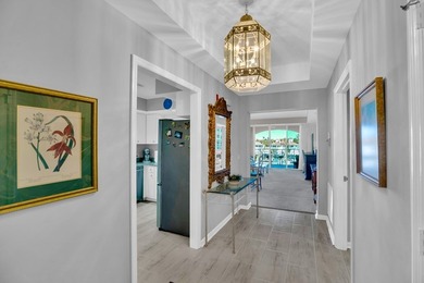 Lovely Harbor front unit with sunny eastern exposure. Beautiful on Grand Harbor Golf and Country Club in Florida - for sale on GolfHomes.com, golf home, golf lot