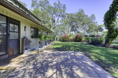 This extraordinary, designer-renovated 4-bedroom, 3-bath on Sugar Mill Country Club in Florida - for sale on GolfHomes.com, golf home, golf lot