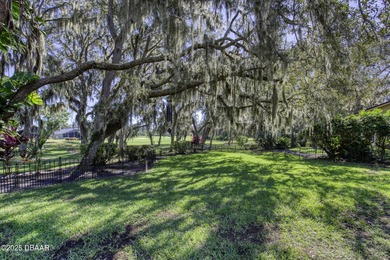 This extraordinary, designer-renovated 4-bedroom, 3-bath on Sugar Mill Country Club in Florida - for sale on GolfHomes.com, golf home, golf lot