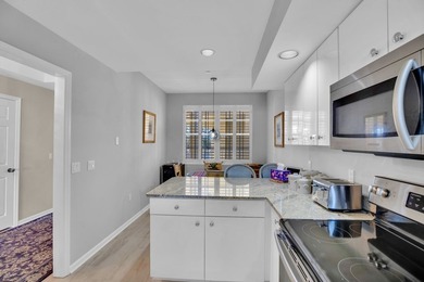 Lovely Harbor front unit with sunny eastern exposure. Beautiful on Grand Harbor Golf and Country Club in Florida - for sale on GolfHomes.com, golf home, golf lot