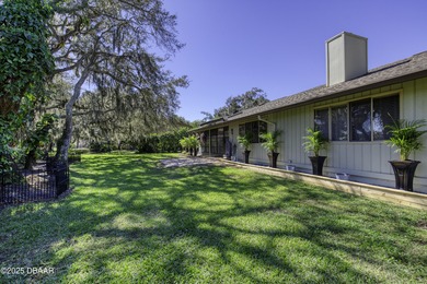 This extraordinary, designer-renovated 4-bedroom, 3-bath on Sugar Mill Country Club in Florida - for sale on GolfHomes.com, golf home, golf lot