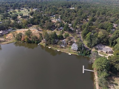Discover a great WATERFRONT opportunity in the gated community on Hide-A-Way Lake Golf Course in Texas - for sale on GolfHomes.com, golf home, golf lot