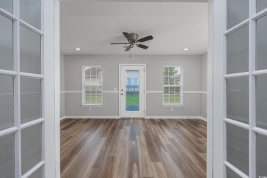 This beautifully updated single-level brick-front home is on Heron Point Golf Club in South Carolina - for sale on GolfHomes.com, golf home, golf lot