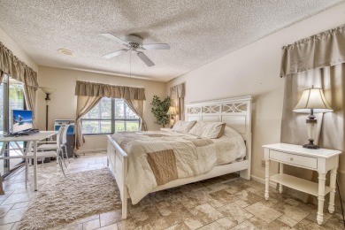 Discover sweeping golf course and lake views at this serene on Old Marsh Golf Club in Florida - for sale on GolfHomes.com, golf home, golf lot