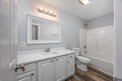 This beautifully updated single-level brick-front home is on Heron Point Golf Club in South Carolina - for sale on GolfHomes.com, golf home, golf lot