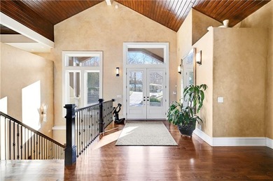 Stunning custom reverse 1.5-story home perfectly positioned on a on Loch Lloyd Country Club in Missouri - for sale on GolfHomes.com, golf home, golf lot