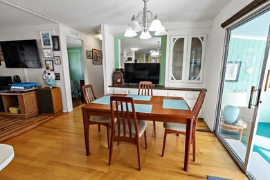 Live the vacation every single day in vibrant Barefoot Bay! This on Barefoot Bay Golf Course in Florida - for sale on GolfHomes.com, golf home, golf lot