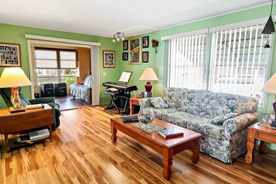 Live the vacation every single day in vibrant Barefoot Bay! This on Barefoot Bay Golf Course in Florida - for sale on GolfHomes.com, golf home, golf lot