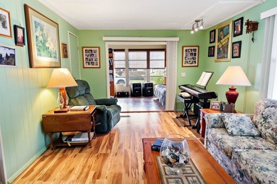 Live the vacation every single day in vibrant Barefoot Bay! This on Barefoot Bay Golf Course in Florida - for sale on GolfHomes.com, golf home, golf lot