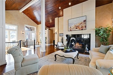 Stunning custom reverse 1.5-story home perfectly positioned on a on Loch Lloyd Country Club in Missouri - for sale on GolfHomes.com, golf home, golf lot