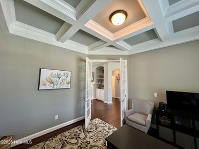 This exceptional residence is located within The Lakes at on Cape Fear National At Brunswick Forest in North Carolina - for sale on GolfHomes.com, golf home, golf lot