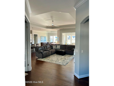 This exceptional residence is located within The Lakes at on Cape Fear National At Brunswick Forest in North Carolina - for sale on GolfHomes.com, golf home, golf lot