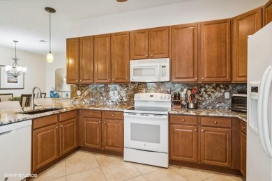 Premium lot villa offers 2 bedrooms, 2 full baths, plus a on PGA Golf Club in PGA Village in Florida - for sale on GolfHomes.com, golf home, golf lot
