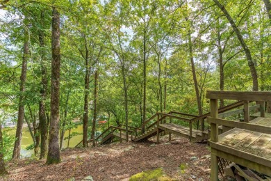 BRAND NEW ROOF on this WATERFRONT Charmer on Lake Pineda! Enjoy on Coronado Golf Course in Arkansas - for sale on GolfHomes.com, golf home, golf lot