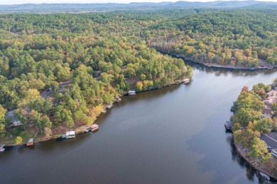 BRAND NEW ROOF on this WATERFRONT Charmer on Lake Pineda! Enjoy on Coronado Golf Course in Arkansas - for sale on GolfHomes.com, golf home, golf lot