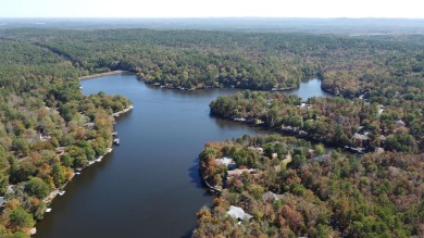 BRAND NEW ROOF on this WATERFRONT Charmer on Lake Pineda! Enjoy on Coronado Golf Course in Arkansas - for sale on GolfHomes.com, golf home, golf lot