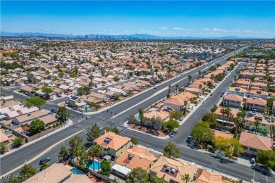 Popular one story home in the NW -- 3 BR, 2 BA, 2-car garage on Durango Hills Golf Club in Nevada - for sale on GolfHomes.com, golf home, golf lot
