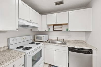 Excellent opportunity to purchase this well priced First Floor on The American Golf Club in Florida - for sale on GolfHomes.com, golf home, golf lot