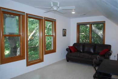 4 BR 2.5 bath home nestled on .55 acres (2 lots) surrounded by on White Bluff Resort - New Course in Texas - for sale on GolfHomes.com, golf home, golf lot