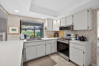 Beautifully maintained one-story, 4-bedroom home in highly on Eastpointe Country Club in Florida - for sale on GolfHomes.com, golf home, golf lot