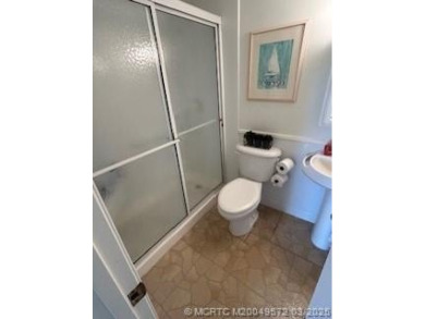 FIRST FLOOR CONDO WITH FANTASTIC VIEWS.   EAST SIDE OF PALM CITY on Monterey Yacht and Country Club in Florida - for sale on GolfHomes.com, golf home, golf lot