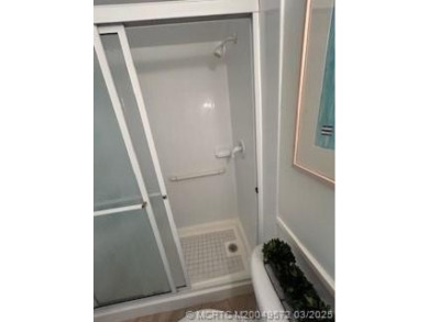 FIRST FLOOR CONDO WITH FANTASTIC VIEWS.   EAST SIDE OF PALM CITY on Monterey Yacht and Country Club in Florida - for sale on GolfHomes.com, golf home, golf lot