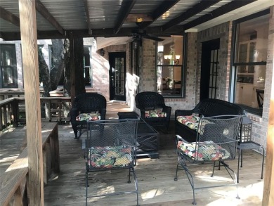 4 BR 2.5 bath home nestled on .55 acres (2 lots) surrounded by on White Bluff Resort - New Course in Texas - for sale on GolfHomes.com, golf home, golf lot